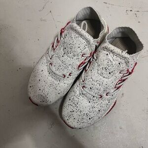 Puma Ignite White and Black Speckled Sneakers with Red Accents